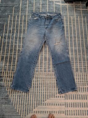 Vintage Men's Blue Distressed Jeans
